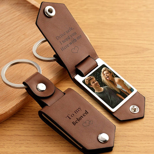 Leather keychain with a personalized family photo and engraved message