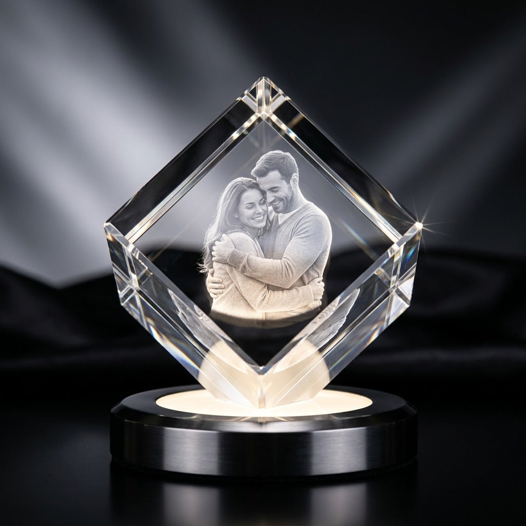 Diamond edge photo crystal with an engraved couple on a lit base
