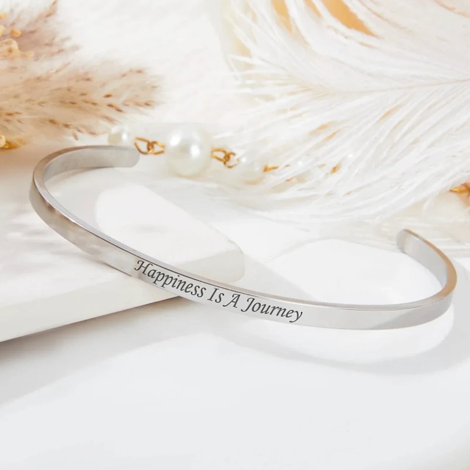 Engraved silver cuff bracelet example