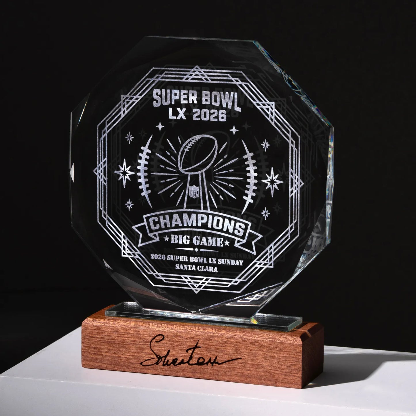Octagon crystal award engraved with a championship design on a wooden base